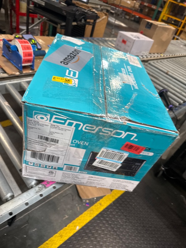 Photo 1 of ***DAMAGE MINOR*** Emerson MW7302B Compact Countertop Microwave Oven with Touch Control, LED Display, 700W, 10 Power Levels, 6 Auto Menus, Glass Turntable and Child Safe Lock, 0.7 Cu., Ft. Black