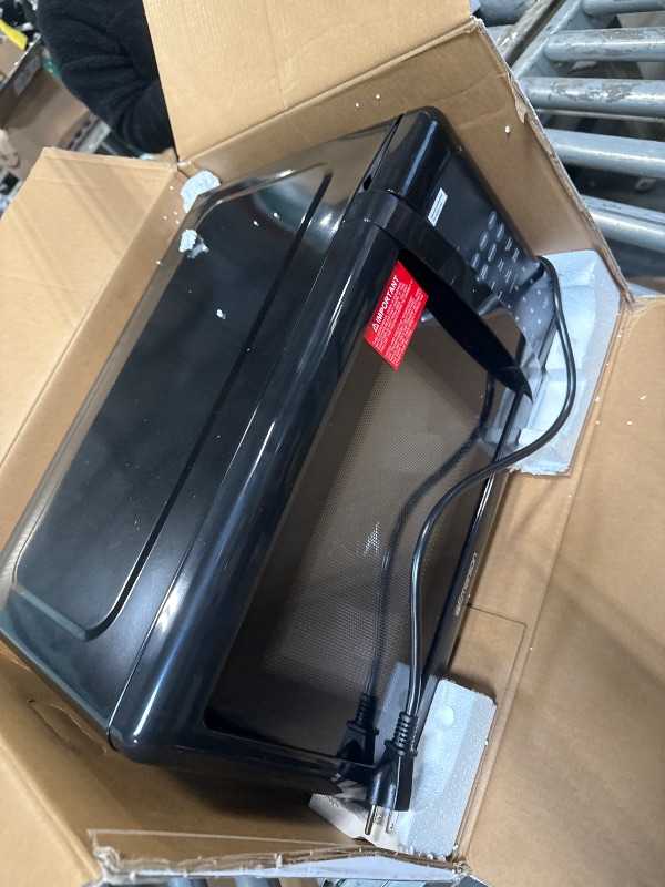 Photo 1 of ***DAMAGE MINOR*** Emerson MW7302B Compact Countertop Microwave Oven with Touch Control, LED Display, 700W, 10 Power Levels, 6 Auto Menus, Glass Turntable and Child Safe Lock, 0.7 Cu., Ft. Black