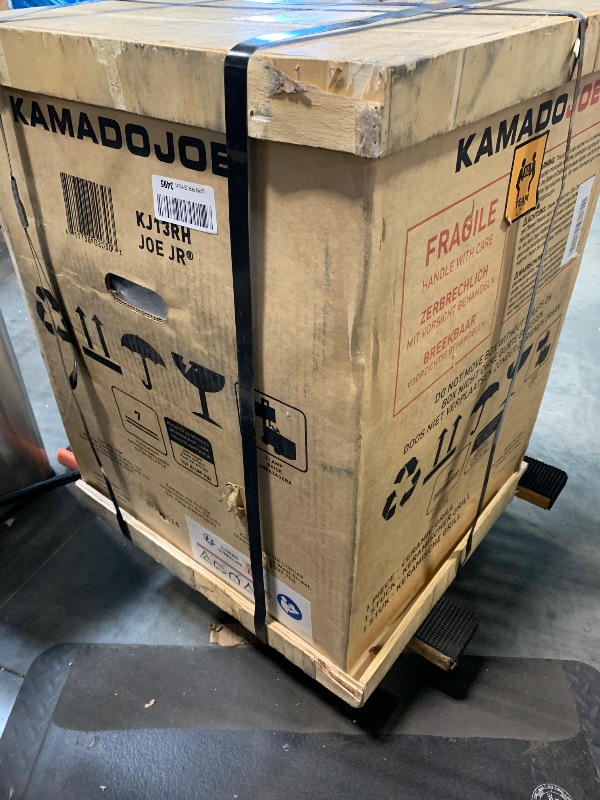 Photo 1 of ***FINAL SALE*** Kamado Joe Joe Jr 13.5-inch Portable Ceramic Charcoal Grill with Grill Stand, Stainless Steel Cooking Grate, Heat Deflectors and Ash Tool in Red, Model KJ13RH