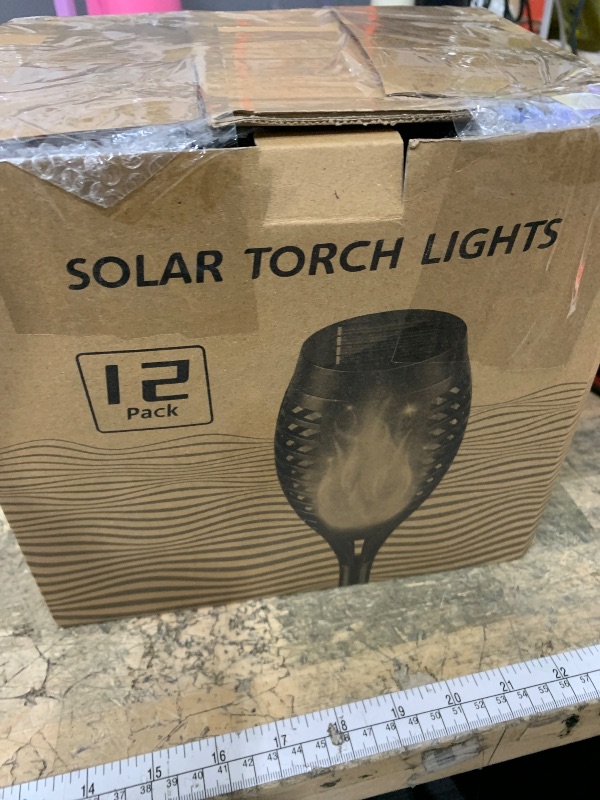 Photo 1 of 12 Pack Solar Torch Lights Outdoor, Solar Torches Lights Landscape Decoration Light for Pathway Lawn Patio

