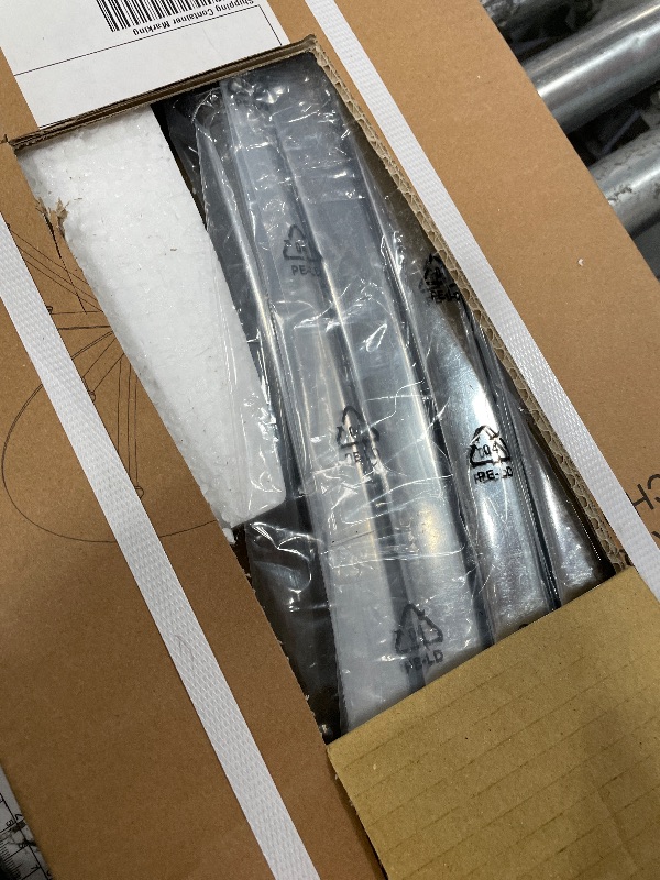 Photo 1 of Coaster Home Furnishings Beckham 46" Round Dining Table with Glass Top and Asterisk Metal Base, Sculptural Modern Glass Dining Table for Kitchens, Chrome