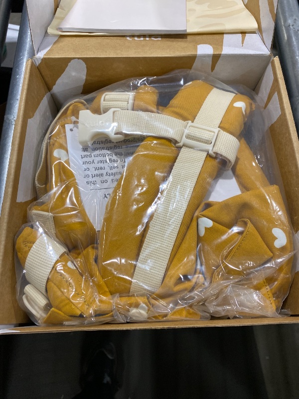 Photo 1 of Baby Tula Cotton Free-to-Grow Baby Carrier - Adjustable, Comfortable, Newborn to Toddler Carrier - Ergonomic Fit for 7lbs to 45lbs - Back & Front Carry Options - Play (Yellow/Hearts)