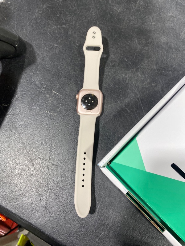Photo 1 of Apple Watch Series 10 [GPS, 42mm] - Rose Gold Aluminum Case with Light Blush Sport Band, S/M (Renewed Premium)