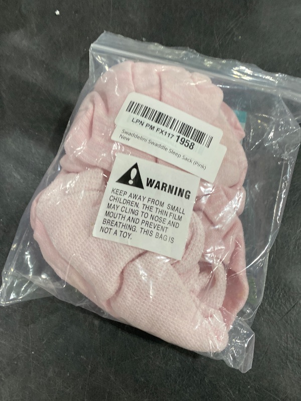 Photo 1 of Swaddelini Swaddle Sleep Sack (Pink)