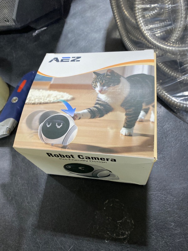 Photo 1 of AEZ Robot Camera 1080P HD Lens Pet Camera Indoor Movable with Auto-Recharge, 2-Way Audio,Blinky Bot with Night Vision,Distance Bot Smart App Control for Cats/Dogs/Baby/Elderly (SD/Cloud Storage)