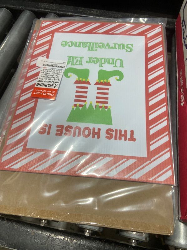 Photo 1 of Elf Surveillance Magic Set – 32 piece set - Yard Sign with Wire Stake + Elf Cam Gigglegram Cards | 12x15” Waterproof Double-Sided Santa Cam Sign | 24 Elf Jokes, Elf Cams, Nice/Naughty & Welcome Notes