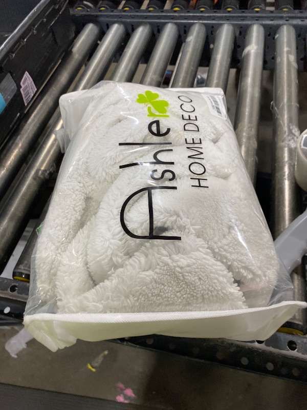 Photo 1 of Ashler Faux Fur Rug, Upgraded Soft Faux Rabbit Fur White Area Rugs, 2 x 6 Feet, Machine Washable Nursery Decor Throw Rugs for Bedroom, Kids Room, Living Room