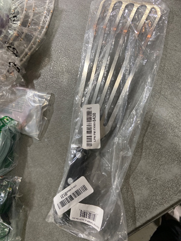 Photo 1 of 4" x 9" Chef's Slotted Turner with Ultra Durable Handle - Right Hand