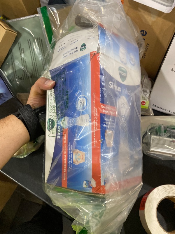 Photo 1 of Vicks Sinus Inhaler, New & Improved Non-Medicated Steam Inhaler for Sinus Relief, Allergies, Congestion & Colds, Vocal Steamer, Soothes Nasal & Throat Passages, Works with VapoPads (1 Included)