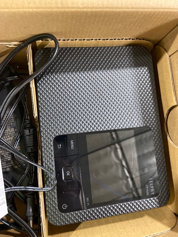 Photo 1 of Canon Selphy CP1500 Wireless Compact Photo Printer (Black)