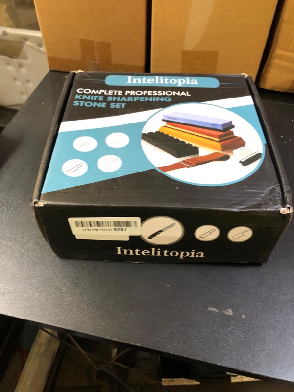 Photo 1 of Intelitopia Complete Knife Sharpening Stone Set – Dual Grit Whetstone 400/1000 3000/8000 Knife Sharpener with Leather Strop, Flattening Stone, Bamboo Base, 3 Non-slip Rubber Bases & Angle Guide