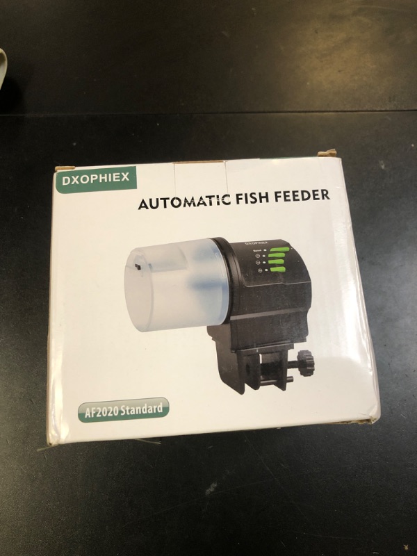 Photo 1 of DXOPHIEX Automatic Fish Feeder Food Dispenser Vacation Fish Feeder Powered by Battery and USB for Aquarium and Turtle Tank