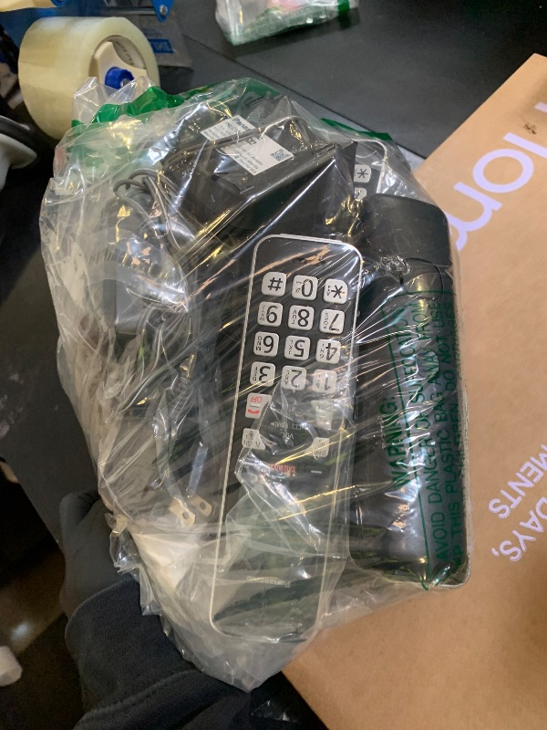 Photo 1 of Panasonic Cordless Phone with Advanced Call Block, Link2Cell Bluetooth, One-Ring Scam Alert, and 2-Way Recording, Answering Machine, 5 Handsets - KX-TGF975B (Black/Silver Trim)