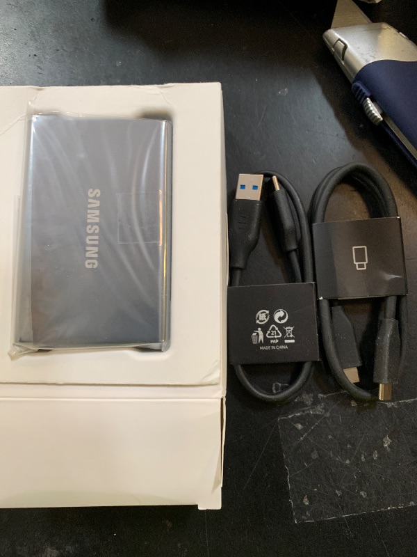 Photo 1 of Samsung T7 Portable SSD, 2TB External Solid State Drive, Speeds Up to 1,050MB/s, USB 3.2 Gen 2, Reliable Storage for Gaming, Students, Professionals, MU-PC2T0T/AM, Gray