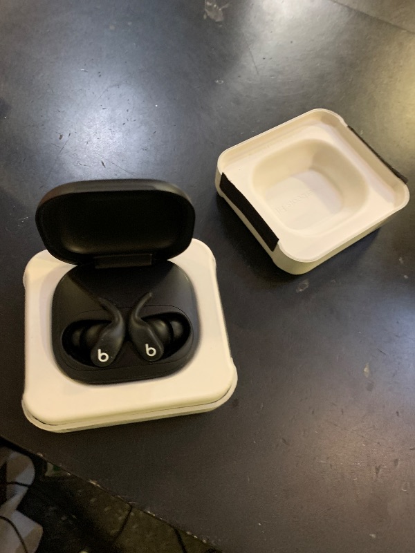 Photo 1 of Beats Powerbeats Fit - Wireless Noise Cancelling Workout Earbuds with Secure-Fit Wingtips, Up to 30-Hour Battery Life, Sweat & Water Resistant, Apple & Android Compatible - Jet Black