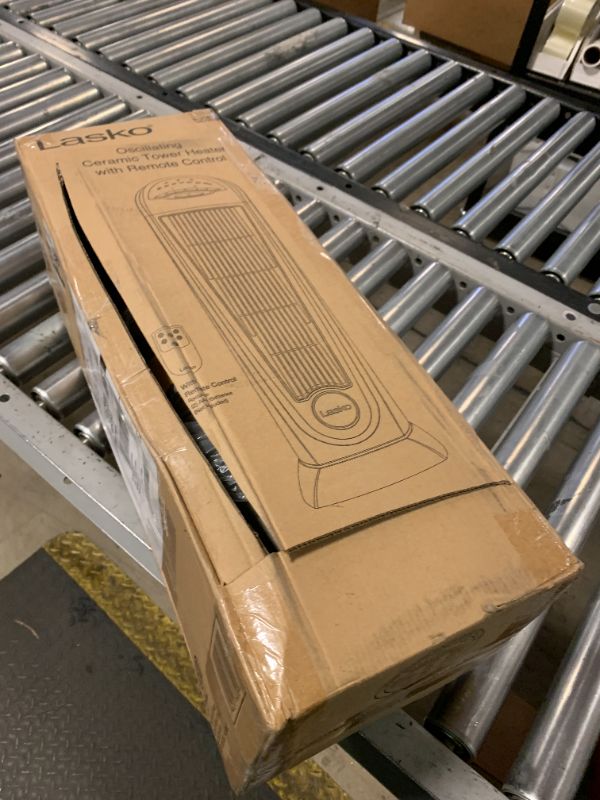 Photo 1 of NON FUNCTIONAL - PARTS ONLY ----------------------------------------------------------------------------------------Lasko 1500W Ceramic Tower Space Heater with Remote, Thermostat, Timer & Widespread Oscillation, Portable Electric Heater for Indoor Use, Be