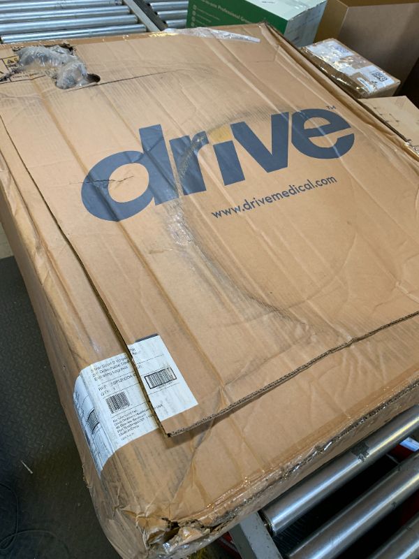 Photo 1 of Drive Medical SSP220DDA-ELR Silver Sport 2 Full-Reclining Transport Wheelchair with Detachable Desk Arms and Swing-Away Elevating Leg Rest, Black