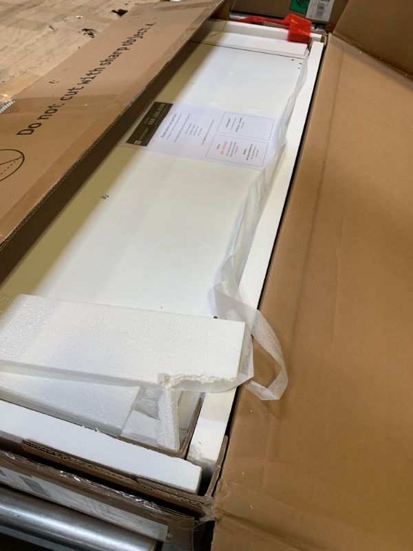 Photo 1 of WHITE L SHAPED DESK 