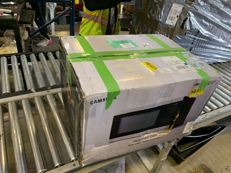 Photo 1 of SAMSUNG 1.9 cu. ft. Countertop Microwave with Sensor Cooking, Matte Black Stainless Steel, MS19DG8500MTAA