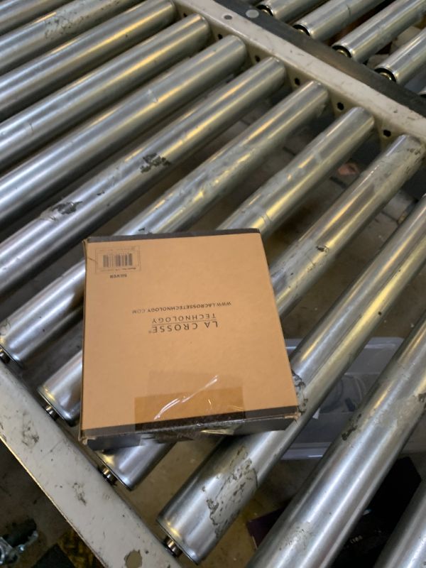 Photo 1 of La Crosse Technology 616-12667-INT Silver Atomic Projection Alarm Clock with Temperature