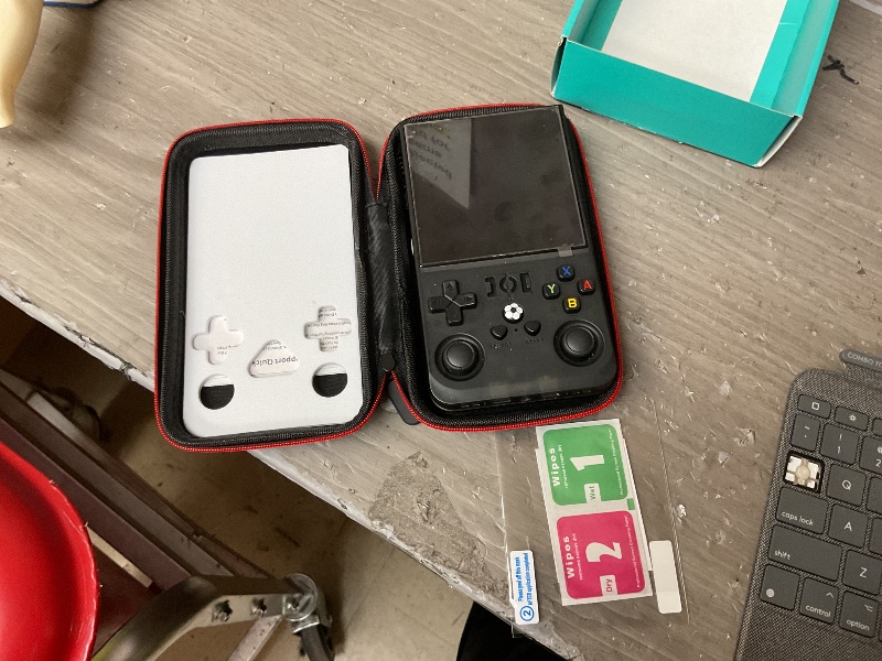 Photo 4 of R36MAX Retro Handheld Game Console, 4.0 inch Retro Gaming Console with 64GB Memory, Video Game Consoles with 4000mAh Battery and 30+ Emulators, Ink Black