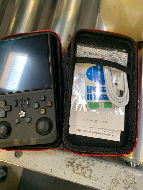 Photo 1 of R36MAX Retro Handheld Game Console, 4.0 inch Retro Gaming Console with 64GB Memory, Video Game Consoles with 4000mAh Battery and 30+ Emulators, Ink Black