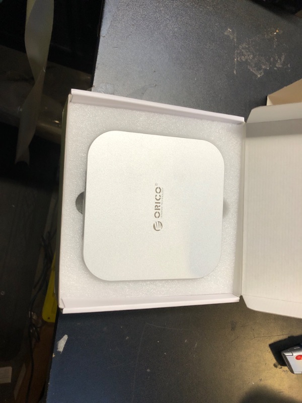 Photo 1 of ORICO MiniMate Laptop Docking Station for Mac mini M4 Built-in 2TB SSD (Non-Removable) 5Gbps, USB A*4, USB-C, SD/TF 3.0, 3.5mm Audio, Includes 2 Cables – M4SE