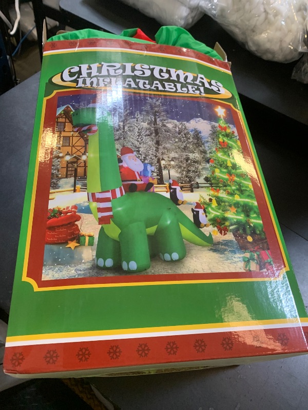 Photo 1 of HZGDEJTG 13ft Christmas Inflatable Outdoor Decorations, Dinosaur Back Santa Claus Inflatable Decorations with LED Lights for Indoor Outdoor Patio Garden Christmas Decorations
