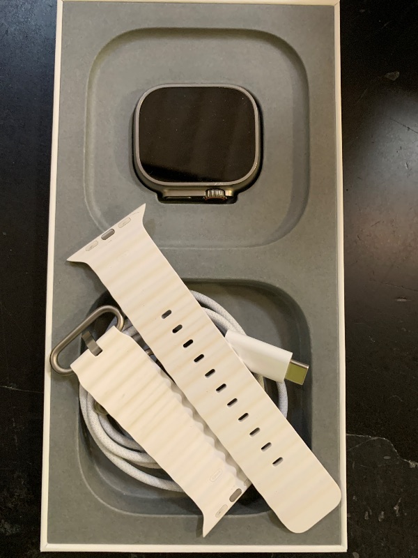 Photo 1 of Apple Watch Ultra [GPS + Cellular 49mm] Titanium Case with White Ocean Band, One Size (Renewed Premium)