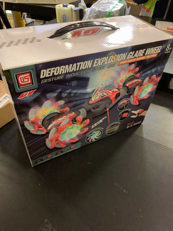 Photo 1 of 1:12 Gesture Sensing RC Stunt Car, 2-in-1 Hand Controlled Remote Control Twist Cars with Light & Music, 4WD 360° Rotate Transform Drift, Gifts for 6-8-12 Kids Age 6 7 8 9 10 11 12 Yrs Old?(Blue)