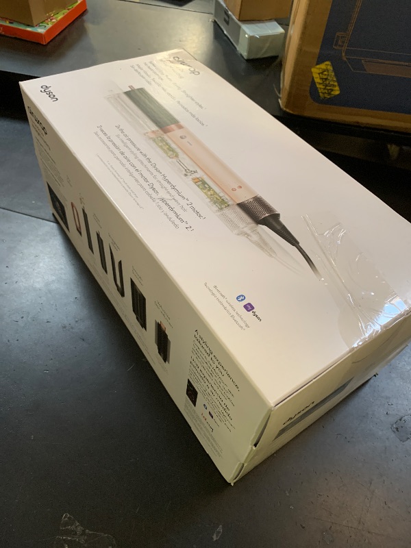 Photo 1 of Dyson Airwrap Co-anda2x™ Multi-Styler and Dryer Straight+Wavy in Ceramic Pink