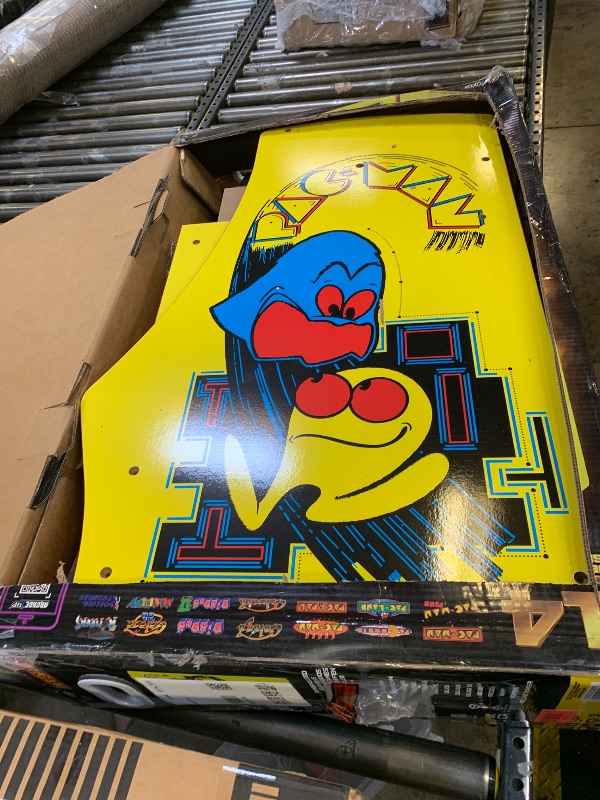 Photo 1 of Arcade1Up PAC-Man Deluxe Arcade Machine for Home - 5 Feet Tall - 14 Classic Games