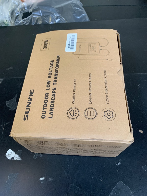 Photo 1 of SUNVIE 300W Low Voltage Landscape Transformer with 2 Independent Control Output Landscape Lighting Transformer with Timer and Photocell Sensor 120V AC to 12/14V AC Weatherproof Low Voltage Transformer