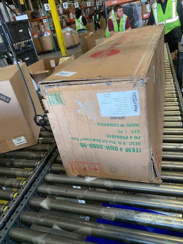 Photo 1 of National Tree Company 9 ft Pre-Lit Dunhill Fir Artificial Christmas Tree, 900 LED Lights, 4,026 Tips, Foot Pedal, 10 Light Functions, Includes Stand, Green