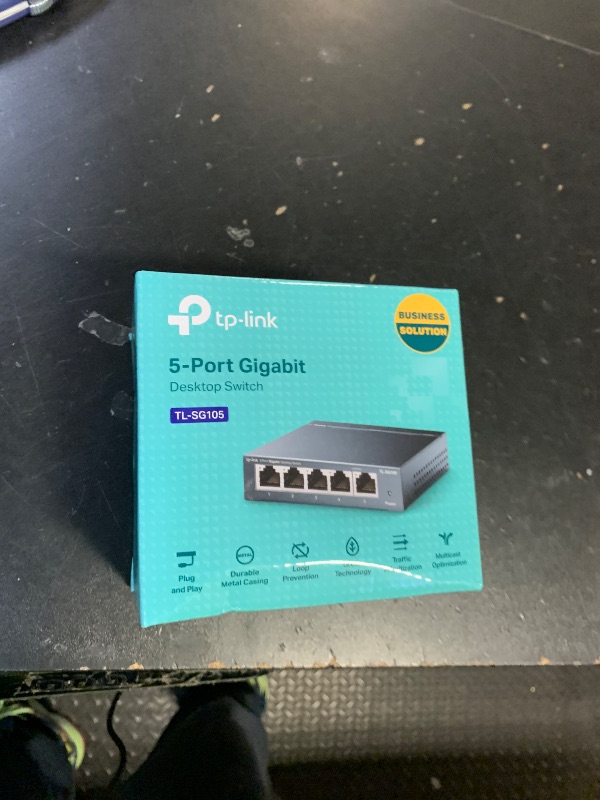 Photo 1 of TP-Link TL-SG105, 5 Port Gigabit Unmanaged Ethernet Switch, Network Hub, Ethernet Splitter, Plug & Play, Fanless Metal Design, Shielded Ports, Traffic Optimization