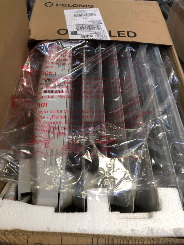 Photo 1 of PELONIS Radiator Heater for Large Space, Electric Oil Filled Radiator, Dual Knobs, 1500W, Quiet Space Heater, 3 Modes, Tip-over Protection