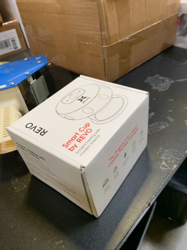 Photo 1 of REVO The Original 4-in-1 Smart Cupping Therapy Massager, Red Light Therapy for Targeted Pain Relief, Knots, Aches, Muscle Soreness, Circulation & Tighter Skin, Portable Cupping Kit