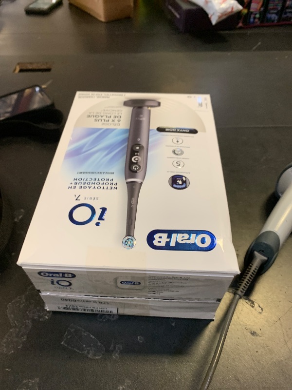 Photo 1 of Oral-B iO Deep Clean + Protect Rechargeable Electric Toothbrush, Black, iO Series 7, 2 Replacement Brush Heads, Charging Travel Case