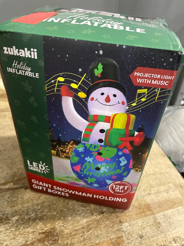 Photo 1 of 12FT Giant Christmas Inflatables Snowman Decorations Built-in Music Box & 360° Rotation 3-Colored LEDs Huge Christmas Inflatable Large Tall Snowman Christmas Blow Ups Decoration Outdoor Xmas New Year