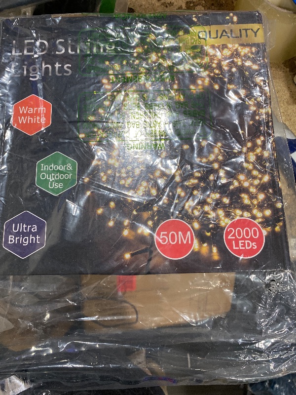 Photo 1 of ***STOCK PHOTO FOR REFERENCE ONLY***Areker 164ft 2000LED Christmas Lights Outdoor Indoor, Green Wire Christmas Day String Lights Plug in, Ultra Bright 8 Modes Waterproof Fairy Lights for Xmas Tree Party Wedding Decoration, White