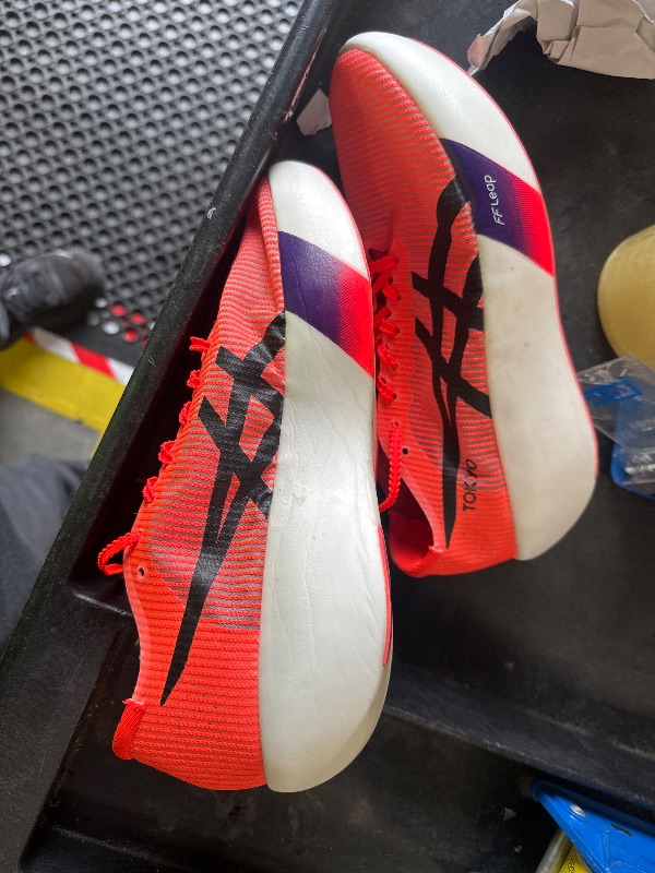 Photo 1 of **DIRTY**
ASICS Unisex METASPEED Sky Tokyo Running Shoes, 9M / 10.5W, Flash RED/Black