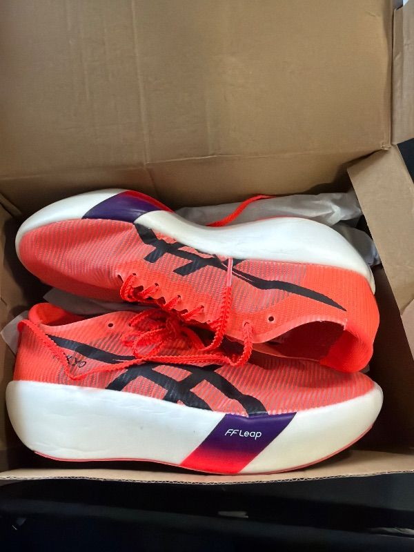 Photo 1 of **DIRTY**
ASICS Unisex METASPEED Sky Tokyo Running Shoes, 9M / 10.5W, Flash RED/Black