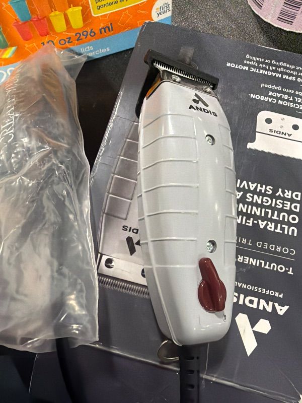 Photo 1 of *UNTESTED*
Andis 04780 Professional T-Outliner Beard & Hair Trimmer for Men with Carbon Steel T-Blade, Bump Free Technology – Corded Electric Beard Trimmer, GTO, Grey