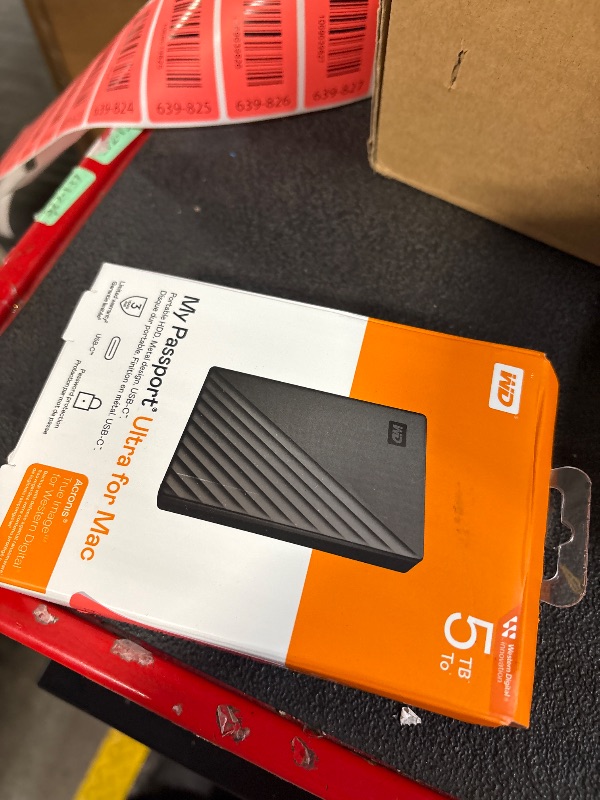 Photo 1 of *UNTESTED*
WD 5TB My Passport Ultra for Mac Silver, Portable External Hard Drive, backup software with defense against ransomware, and password protection, USB-C and USB 3.1 - WDBPMV0050BSL-WESN