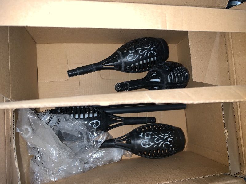 Photo 1 of **USED** SIMILAR ITEMS**TomCare Solar Lights, 43" Waterproof Flickering Flames 96 LED Torches Outdoor Landscape Decoration Lighting Auto On/Off Pathway Lights for Garden Patio Yard, Black(4)