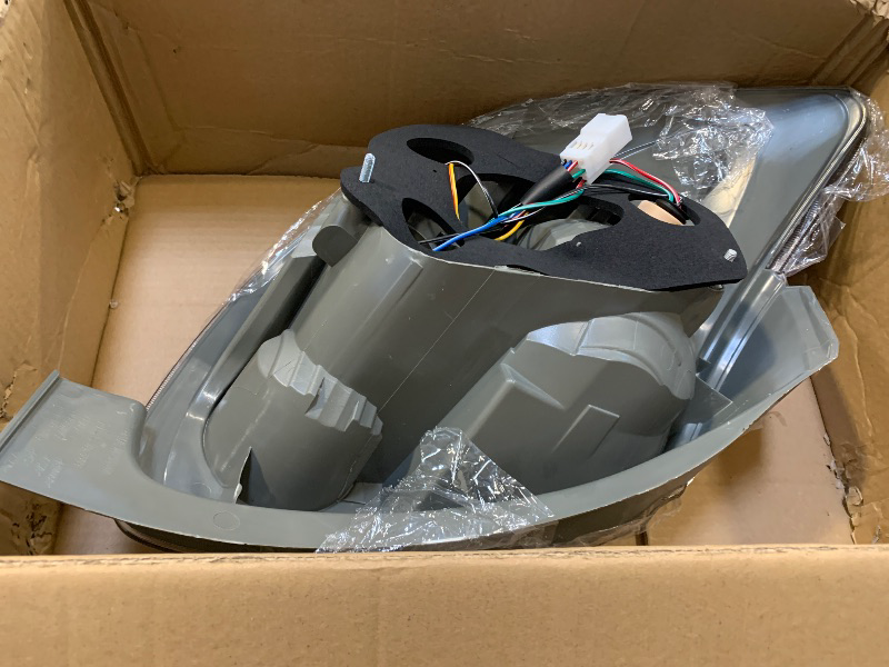 Photo 1 of headlight assembly-----UNKNOWN MODEL