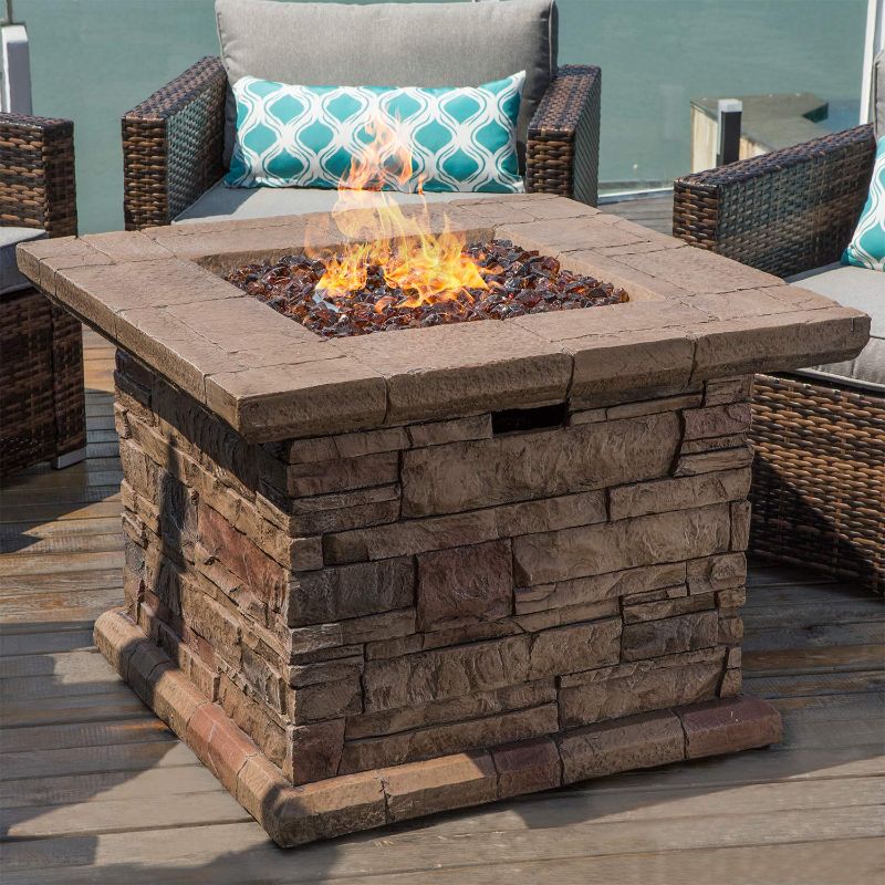 Photo 1 of COSIEST outdoor propane fire pit table, model C0150190.