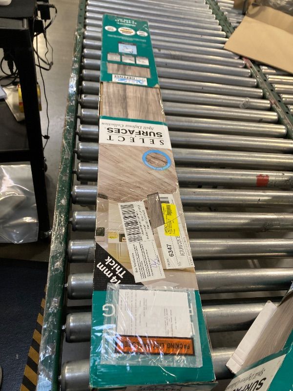 Photo 1 of Select Surfaces Southern Grey Spill Defense Laminate Flooring 12.34 sq. ft. per box