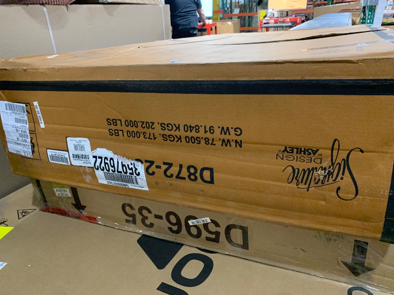 Photo 1 of Signature Design by Ashley Fortmaine Contemporary Dining Table with Natural Live Edge, Light Brown & Black