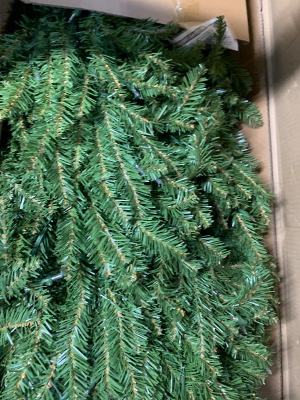 Photo 1 of National Tree Company 9 ft Pre-Lit Dunhill Fir Artificial Christmas Tree, 900 LED Lights, 4,026 Tips, Foot Pedal, 10 Light Functions, Includes Stand, Green